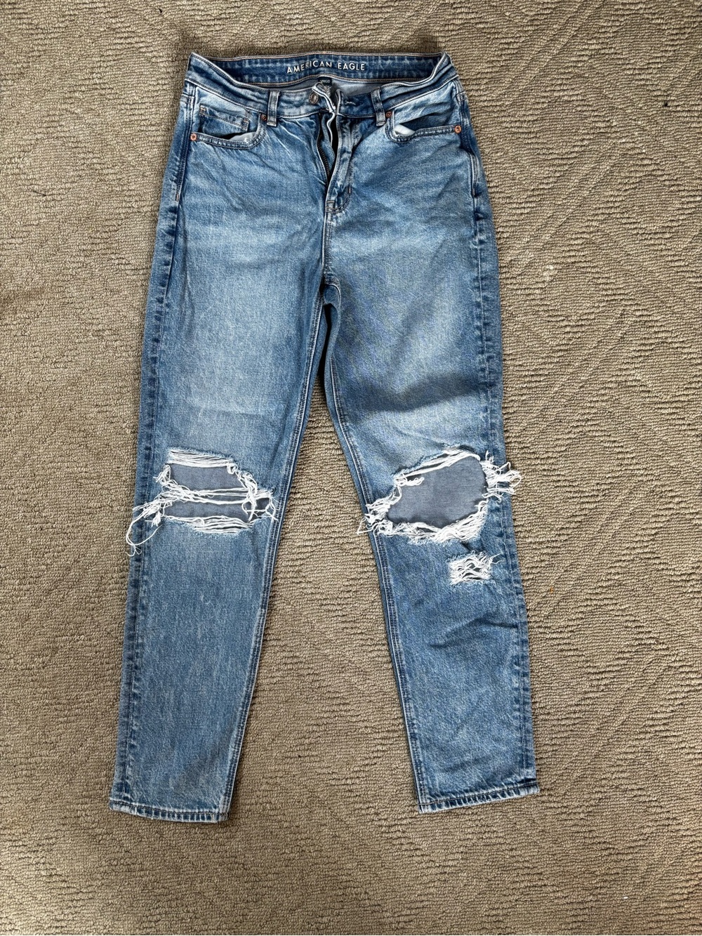 American Eagle Outfitters Light Blue Denim Jeans with Tan Stitching